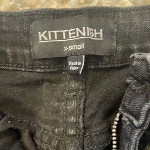 Kittenish distressed high waisted black denim jeans